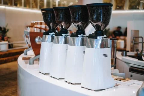 White coffee grinders in a cafe Stock Photos
