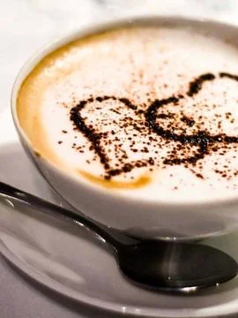 White Coffee with spoon Stock Photos