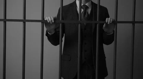 A white collar inside trader in prison Stock Footage 60579006