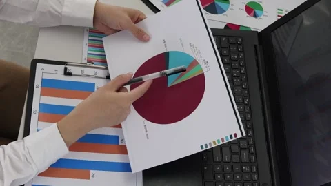 White-collar workers analyzing and checking financial statement data Stock Footage 310097867