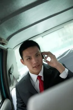 White-collar workers Communication Oriental Asians Asian Conversation a man Stock Photos