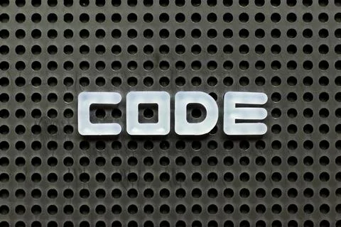 White color letter in word code on black pegboard background Photos