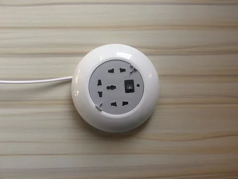 White color multi socket round surge protector and extension cable wire Stock Photos