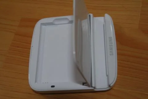 White colored battery charging box for electronic devices like mobile phone Stock Photos