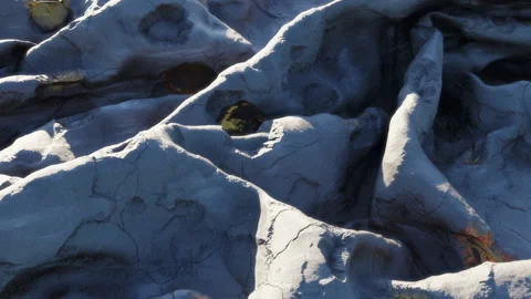 White-colored kind of marble stone texture casting shadows from moving Stock Footage 149804767