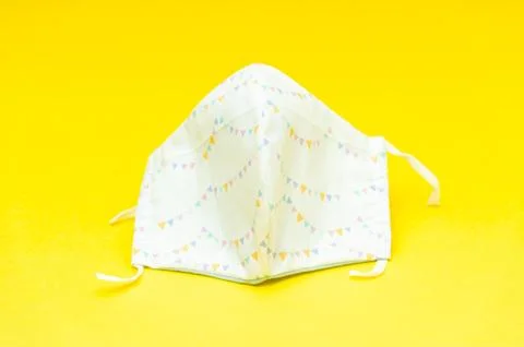 White with colorful triangular flags patterned DIY fabric face mask 스톡 사진