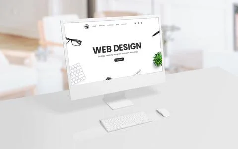 White computer display on an office or studio desk with a web design concept  Ilustración de archivo