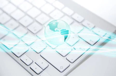 White computer keyboard with blue globe and lights White computer keyboard... Stock-Fotos