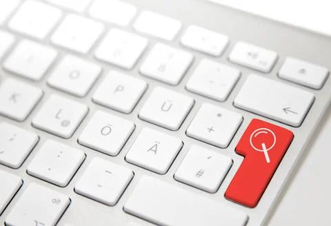 White computer keyboard with red search button White computer keyboard wit... Stock-Fotos