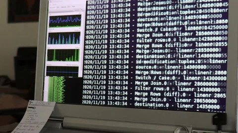 White computer software code moving on a black monitor. Computer hacking in p Stock Footage 144126419