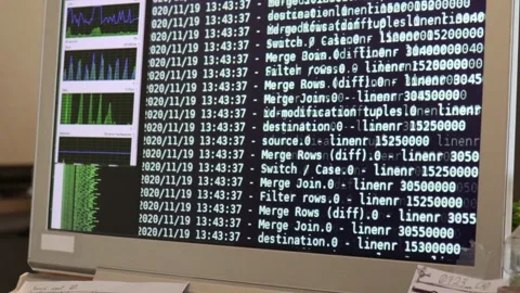 White computer software code moving on a black monitor. Computer hacking in p Stock Footage 144126924