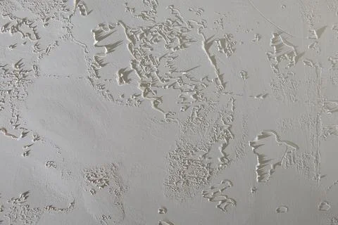 White concrete wall with putty texture 库存照片