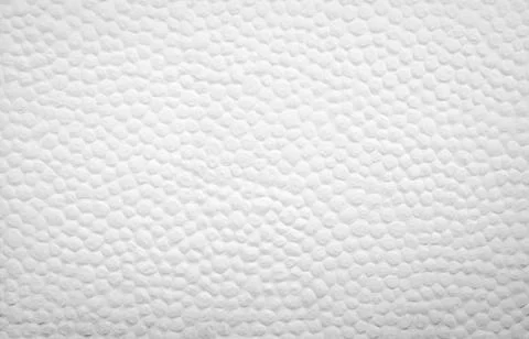 White concrete wall texture background decor with small round convex dot. Whi 库存照片
