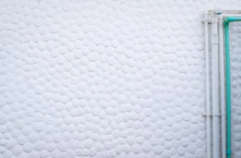 White concrete wall texture background decor with small round convex dot. Ins Foto stock