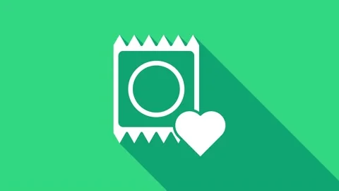 White Condom in package icon isolated on green background. Safe love symbol 動画素材 146981578