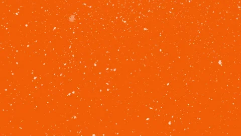 White confetti on an orange background. Stock Footage 315477998
