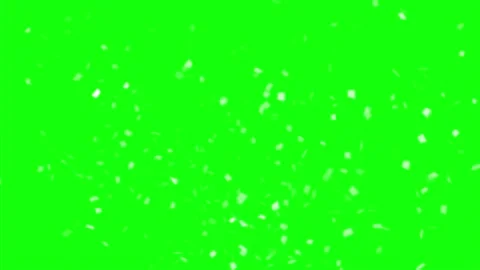 White confetti pieces explode outwards on green screen background Video stock 331767082