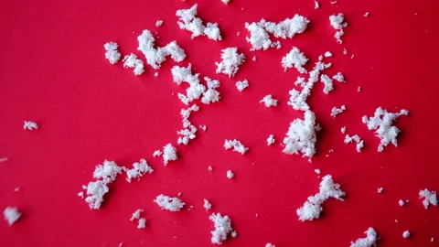 White confetti snowflakes on the Red background. 4k 2023 New year, merry Stock Footage 222440686