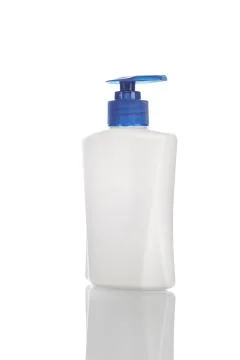 White container for liquid soap or shampoo with a blue cap-dropper isolated o Stock Photos