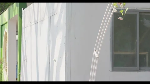 White Container Structure with Window and Shadow Patterns 스톡 동영상 330953506