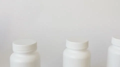 White container tops on production line Vídeos de archivo 45342848