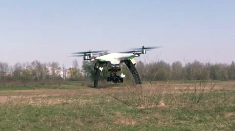 White Copter\drone  with camera  fly  away Video stock 37309226