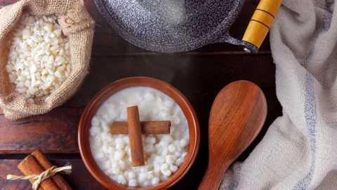 White corn cooked with milk known as canjica, canjico or mungunza Stock Footage 146617874