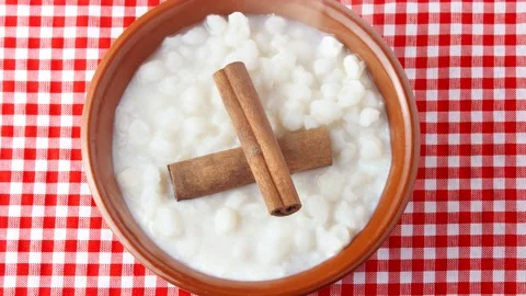 White corn cooked with milk known as canjica, canjico or mungunza Stock Footage 146617876