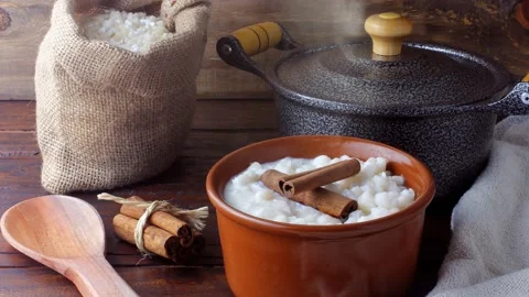 White corn cooked with milk known as canjica, canjico or mungunza Stock Footage 146617877
