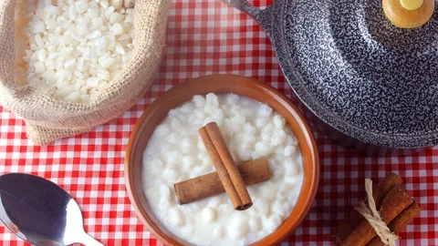 White corn cooked with milk known as canjica, canjico or mungunza, typical di Stock Footage 146617878