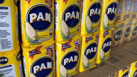 White corn flour packs on a store shelf Stock Footage 108547313