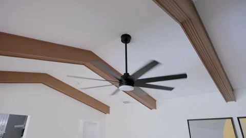 White corner ceiling with three brown decorative wooden beams and black active Stock Footage 249603281