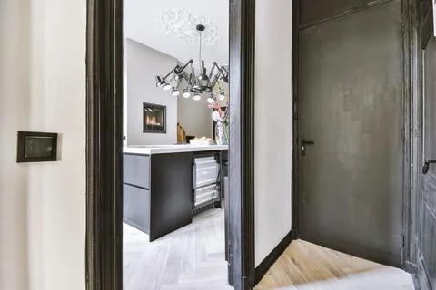 White corridor with black door frames Fotos de archivo