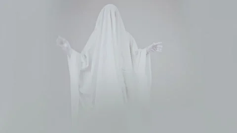 White costumed ghost dances on an isolated white background. Stock Footage 287915722