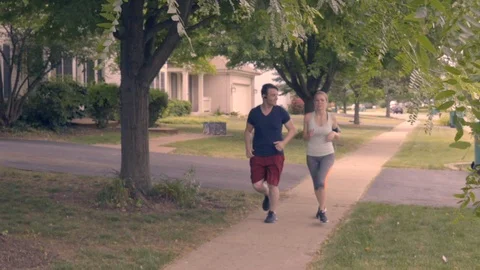White Couple Running 2 Stock Footage 92546340