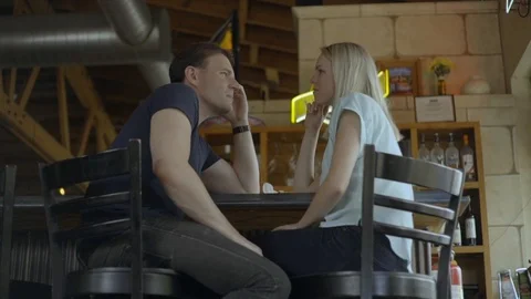 White Couple Talking at Bar 2 Stock Footage 92546700