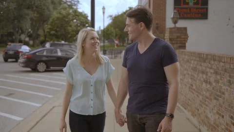 White Couple Walking down Sidewalk 3 Stock Footage 92546834