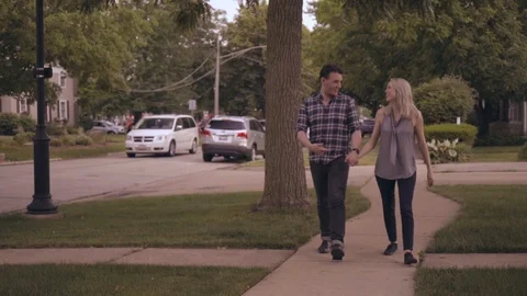 White Couple Walking down Sidewalk 3 Stock Footage 92548400