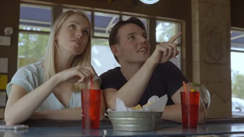 White Couple Watching Game at Bar 1 스톡 동영상 92546653