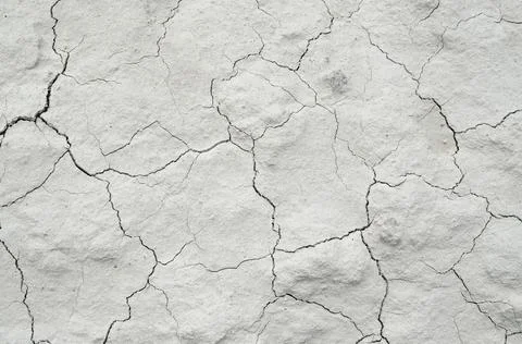 White cracked background texture, light background with dark scratch, the gro Stock Photos