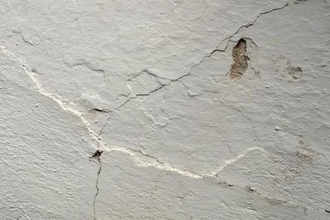 White cracked wall Stock-Fotos