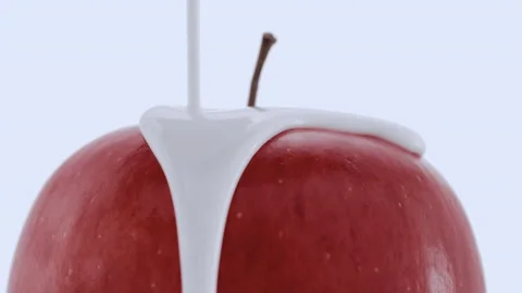 White cream flowing on apple Stock Footage 219464671