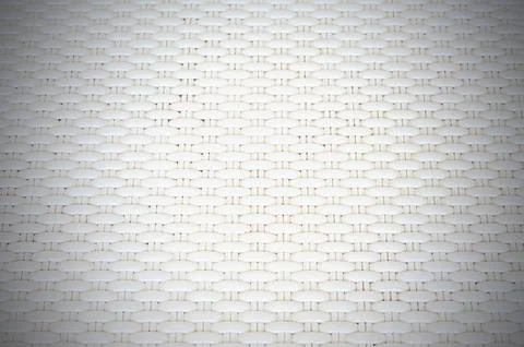 White cream plastic surface with repeating pattern. Stock Photos