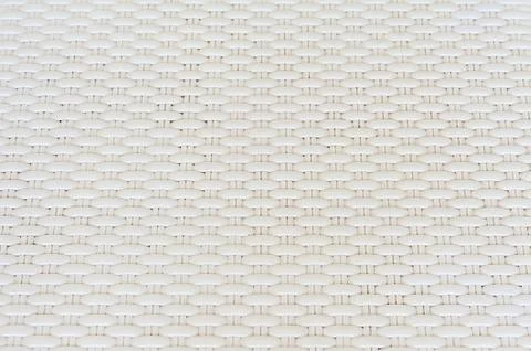 White cream plastic surface with repeating pattern. Stock Photos