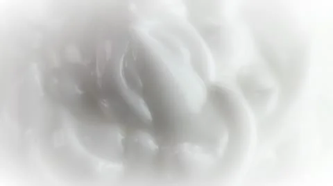 White cream rotating closeup Stock Footage 10748723