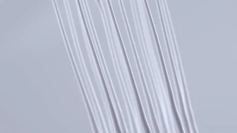 White cream strings in mid air Stock Footage 219491413