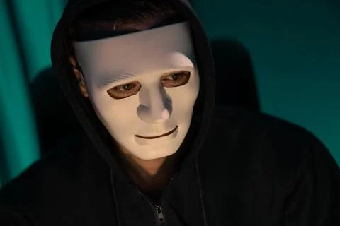 White criminal anonymous mask installing coding password encryption. Pecuniary. 스톡 사진