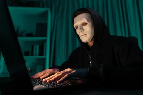 White criminal anonymous mask installing coding password encryption. Pecuniary. 写真素材