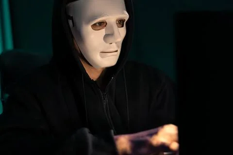 White criminal anonymous mask installing coding password encryption. Pecuniary. 写真素材