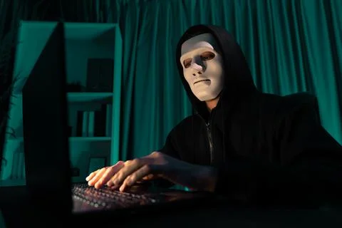 White criminal anonymous mask installing coding password encryption. Pecuniary. 写真素材